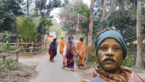 People walking on a village path