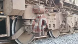 Close-up of train wheels on tracks