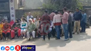 Group of people gathered outdoors on a sunny day.